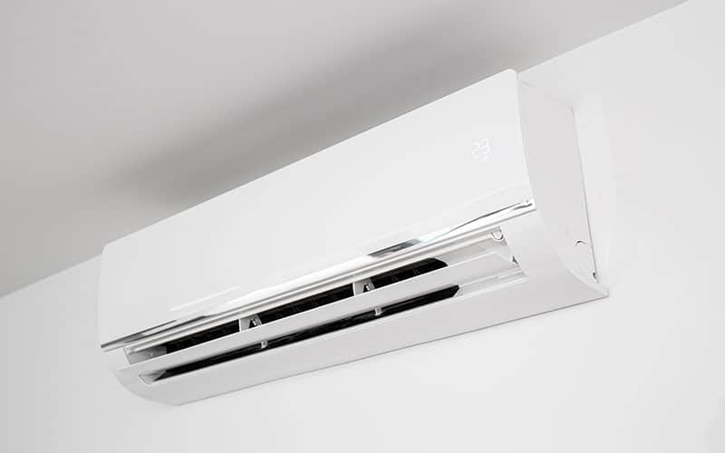 Ductless unit on the wall in a house
