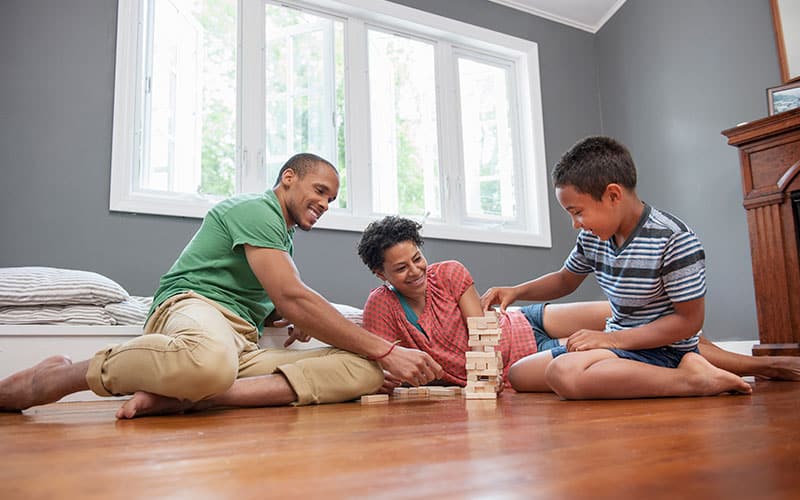 Family playing in living room
