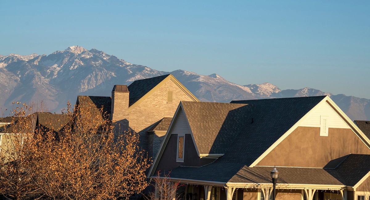 View of Utah houses with mountains in the background