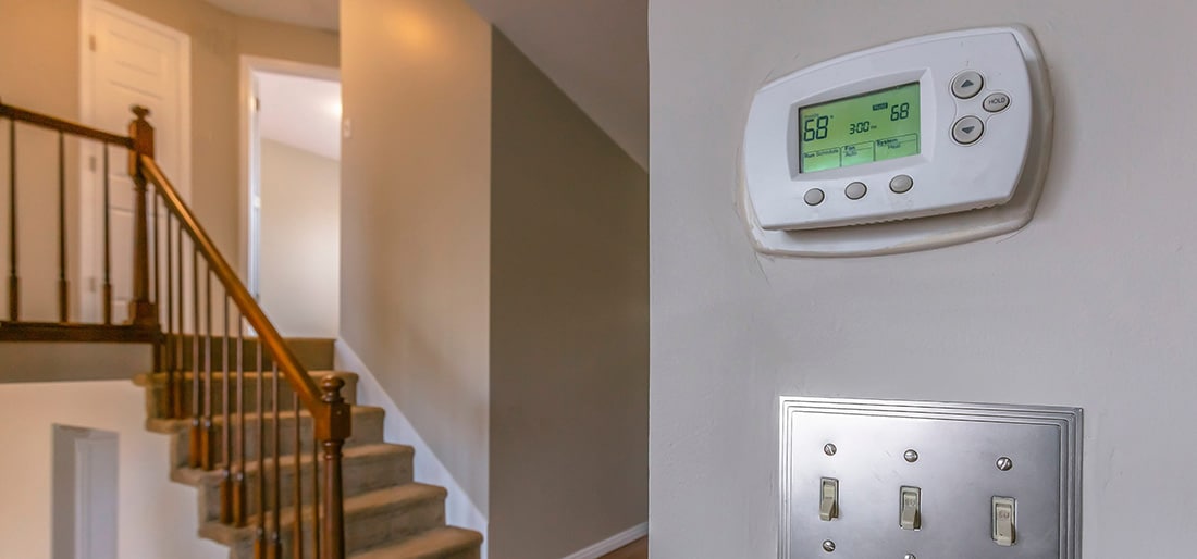 Home thermostat set to 68 degrees